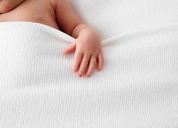 Baby mit Decke Baby mit Decke Nahaufnahme